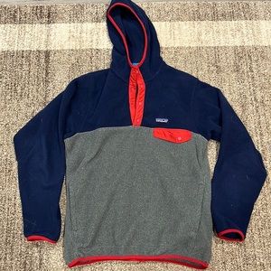 Men’s Patagonia. Grey on bottom, navy blue on top with red trim. Medium.